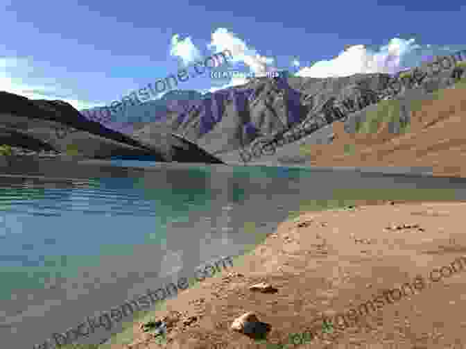 Chandratal Lake, With Its Turquoise Waters And Backdrop Of Snow Capped Peaks, Reflecting The Spirit Of Adventure Poler Trek: Travelouge Suhas Mantri