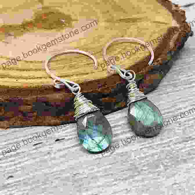 Elegant Wire Wrapped Earrings Featuring Gemstone Beads Suspended From Delicate Wire Coils BoHo Chic Jewelry: 25 Timeless Designs Using Soldering Beading Wire Wrapping And More